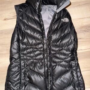 Moving and cleaning out closet. North face vest